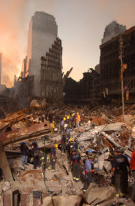 New York City, NY, September 16, 2001 --  Fire fighters and Urban Search and Rescue teams work amidst the rubble of the collapsed World Trade Center. Photo by Andrea Booher/ FEMA News Photo